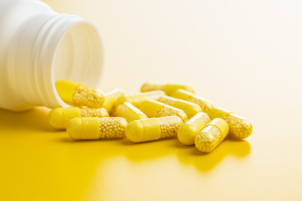 Vitamin capsules. Vitamin C pills.